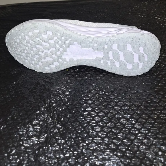 A pair of Nike Revolution 6 in a men's size 12. They're NWT with no flaws.